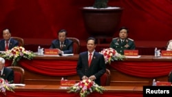 FILE - Vietnam's Prime Minister Nguyen Tan Dung (C, bottom) speaks during the opening ceremony of the 12th National Congress of Vietnam's Communist Party in Hanoi, Vietnam, Jan. 21, 2016.