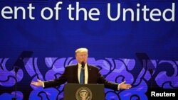 U.S. President Donald Trump speaks on the final day of the APEC CEO Summit ahead of the Asia-Pacific Economic Cooperation (APEC) leaders summit in Danang, Vietnam, Nov. 10, 2017.