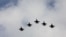 IDF aircraft fly in formation during an inauguration ceremony of a maintenance centre for F-16 fighter jets, in Taichung