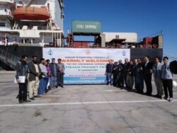 Representatives mark the arrival of the first ship with Afghan-imported cargo, at Gwadar, Pakistan, Jan 14, 2020 (Courtesy - Chinese Embassy)