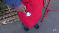 Bell Ringers Collect Money for the Needy at Christmas