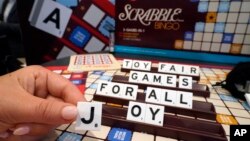 FILE - A Scrabble game with larger tiles is displayed at the 2023 Toy Fair, in New York's Javits Center, Monday, Oct. 2, 2023. (AP Photo/Richard Drew)