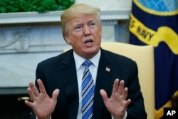 President Donald Trump speaks during a meeting with Israeli Prime Minister Benjamin Netanyahu in the Oval Office of the White House, March 5, 2018, in Washington.