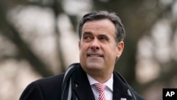 FILE - John Ratcliffe, then the director of national intelligence, waits to board Marine One with then-President Donald Trump at the White House in Washington, Dec. 12, 2020. Ratcliffe has been selected to become CIA director in Trump's second term.