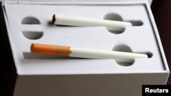 An e-cigarette is an electronic substitute in the form of a rod, slightly longer than a normal cigarette.