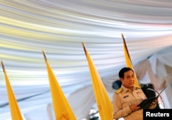 Thailand's Prime Minister Prayut Chan-o-cha gives an opening speech during the dinner for rescue workers and volunteers who participated in the cave rescue earlier this year, in Bangkok, Sept. 6, 2018.
