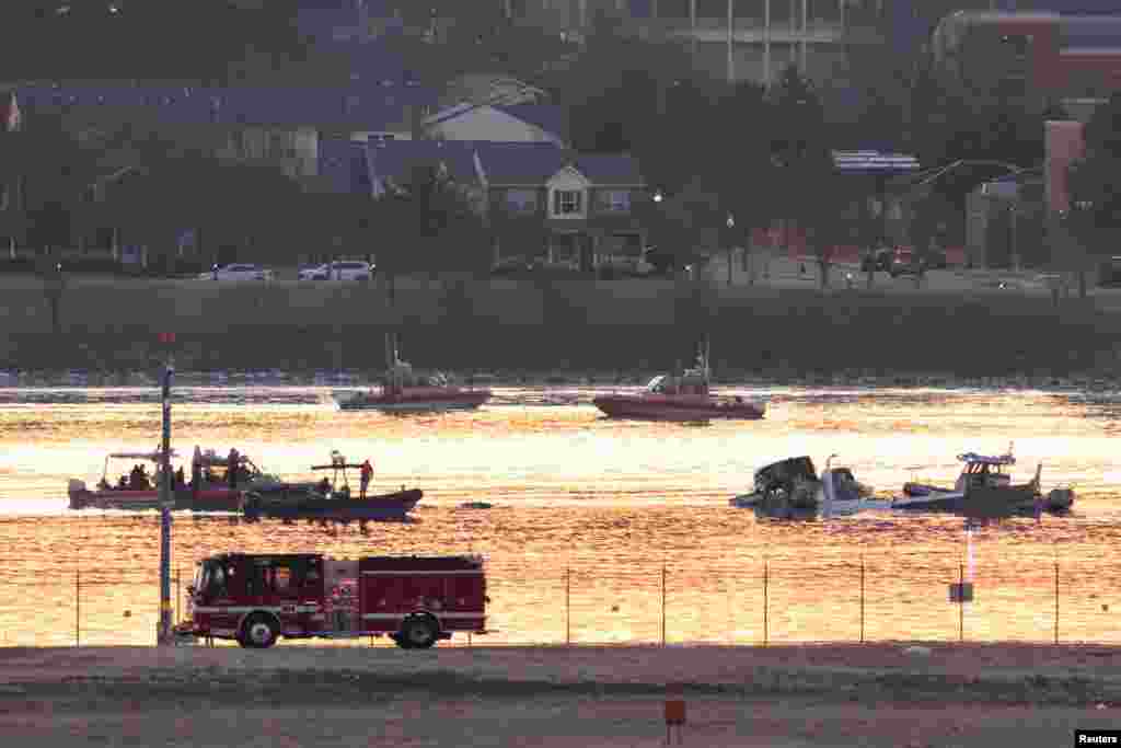 Emergency personnel work at the site of the crash after a Black Hawk helicopter and an American Eagle flight 5342 approaching Reagan Washington National Airport collided and crashed in the Potomac River, outside Washington, Jan. 30. 2025.&nbsp;