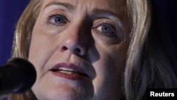 U.S. Secretary of State Hillary Clinton delivers remarks at the Common Ground Awards in honor of slain ambassador to Libya Chris Stevens at the Carnegie Institution for Science in Washington, November 8, 2012.