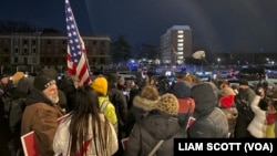 Protesters gathered at the Central Detention Facility prison in Washington late Monday night, Jan. 20, 2025.