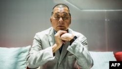 FILE - In this picture taken on June 16, 2020, pro-democracy publisher Jimmy Lai poses during an interview with Agence France-Presse at the Next Digital offices in Hong Kong.