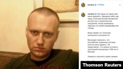 A screenshot of an Instagram post, showing an undated photo of Alexei Navalny in an unknown location