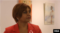 یەکێک لە تووشبوانی شێرپەنجە لە پێشانگاکە