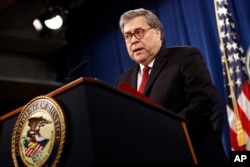 Attorney General William Barr speaks about the release of a redacted version of special counsel Robert Mueller's report during a news conference, Thursday, April 18, 2019, at the Department of Justice in Washington. (AP Photo/Patrick Semansky)