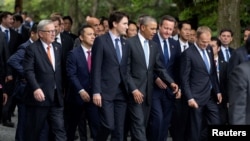 Yevropa Komissiyasi Prezidenti Jan Klod Yunker, Kanada Bosh vaziri Jastin Tryudo, Amerika Prezidenti Barak Obama, Britaniya Bosh vaziri Deyvid Kameron va Yevropa Kengashi Prezidenti Donald Tusk Yaponiyadagi sammitda. 26-may, 2016-yil.