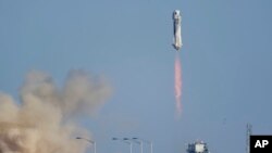 Blue Origin's New Shepard rocket launches carrying passengers William Shatner, Chris Boshuizen, Audrey Powers and Glen de Vries from its spaceport near Van Horn, Texas, Wednesday, Oct. 13, 2021. (AP Photo/LM Otero)