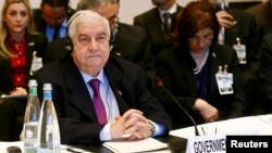 Suriya tashqi ishlar vaziri Valid Muallim tinchlik anjumani paytida, Montre, Shveysariya, 22-yanvar, 2014-yil