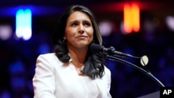 FILE - Tulsi Gabbard speaks at a Republican campaign rally at Madison Square Garden, Oct. 27, 2024, in New York. President-elect Donald Trump has chosen her to become director of national intelligence.