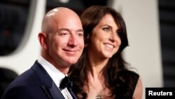 FILE - Amazon's Jeff Bezos and MacKenzie Bezos are seen before their recent divorce at the 89th Academy Awards Oscars Vanity Fair Party, Beverly Hills, California, U.S., Feb 2, 2017.