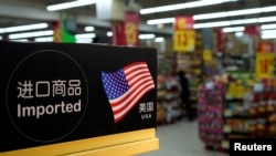 FILE - Imports from the U.S. are seen at a supermarket in Shanghai, China, April 3, 2018.