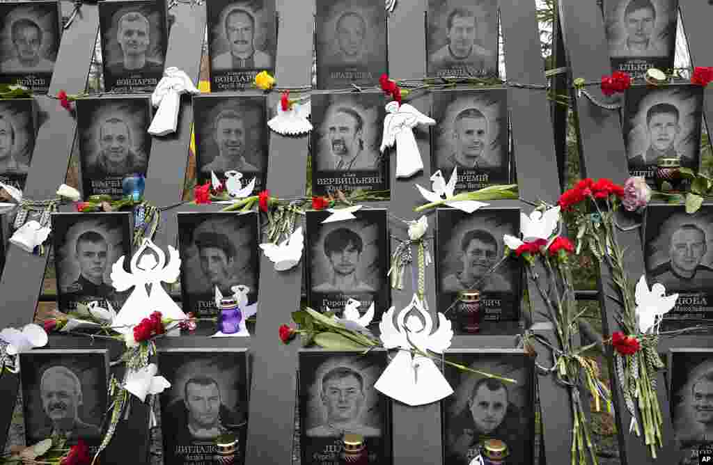 Mementos are seen at a memorial dedicated to people who died in clashes with security forces in late February 2014, at the Independence Square (Maidan) in Kyiv, Ukraine.