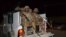 FILE - Pakistani troops are seen on a pick-up truck in Quetta, Baluchistan province, Pakistan, Oct. 25, 2016. 