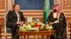 FILE - Secretary of State Michael R. Pompeo meets with Saudi Crown Prince Mohammed bin Salman, in Riyadh, Saudi Arabia, Oct. 16, 2018.