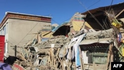 Ovaj materijal primljen 7. januara 2025. prikazuje oštećene kuće u Shigatsu.