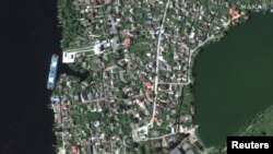 Satelitski snimak pokazuje velike poplave duž rijeke Dnjepar, Reuters on June 6, 2023. Maxar Technologies/Handout via REUTERS