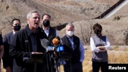 House Minority Leader Kevin McCarthy speaks to the press during a tour for a delegation of Republican lawmakers of the US-Mexico border, in El Paso, Texas, March 15, 2021. 