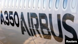 The exterior of an Airbus A350 XWB is pictured during the Airbus annual news conference in Colomiers, near Toulouse January 13, 2015. Airbus clung to the top spot in commercial plane orders by confirming it outsold Boeing last year, while failing to close