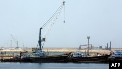 Vehicles are under floodwater from Schuylkill River in the Manayunk section of Philadelphia, in the aftermath of downpours and high winds from the remnants of Hurricane Ida that hit the area.
