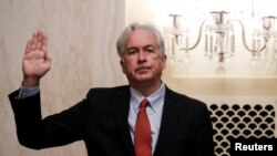 William Burns is sworn in to testify before a Senate Intelligence Committee hearing on his nomination to be director of the Central Intelligence Agency (CIA) on Capitol Hill in Washington, U.S., February 24, 2021. REUTERS/Tom Brenner/Pool