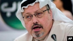 FILE - In this Feb. 1, 2015, file photo, Saudi journalist Jamal Khashoggi speaks during a press conference in Manama, Bahrain. Turkish claims that Khashoggi, who wrote for The Washington Post, was slain inside a Saudi diplomatic mission in Turkey, has put the Trump administration in a delicate spot with one of its closest Mid-east allies. (AP Photo/Hasan Jamali, File)