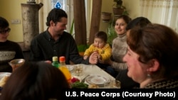 A family shares a meal in Georgia.
