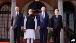 FILE - President Joe Biden greets, from left, Australia's Prime Minister Anthony Albanese, India's Prime Minister Narendra Modi, Biden, and Japan's Prime Minister Fumio Kishida, at the Quad leaders summit in Claymont, Del., Sept. 21, 2024.