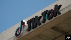 The TikTok logo is seen on the TikTok building in Culver City, California, on March 11, 2024. The U.S. House of Representatives is moving ahead with a bill that would require Chinese company ByteDance to sell TikTok or face a ban in the United States.