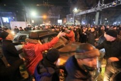 Protesters attend a rally in Almaty, Jan. 4, 2022.