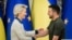 FILE - Ursula von der Leyen, left, President of the European Commission, shakes hands with Ukrainian President Volodymyr Zelenskyy, following a joint press conference in Kyiv, Ukraine, Sept. 20, 2024. 