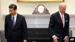 時任美國副總統拜登在白宮接待到訪的時任中國國家副主席習近平。(美聯社2012年2月14日)