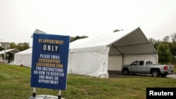 FILE - A drive-thru coronavirus disease (COVID-19) testing facility is seen at the Regeneron Pharmaceuticals company's Westchester campus in Tarrytown, New York, Sept. 17, 2020. 