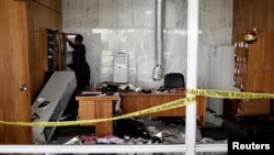 Danos causados por apoiantes do ex-presidente brasileiro Jair Bolsonaro durante o ataque ao Palácio do Planalto em Brasília a 8 janeiro 2023