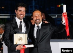 Director Asghar Farhadi and actor Shahab Hosseini after their Cannes wins.