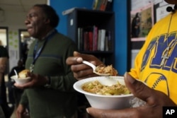 This photo shows a bowl of cassoulet, a type of French stew, from the Sanford Restaurant at the Guest House, a homeless shelter in Milwaukee, Dec. 8, 2015.