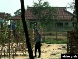 FILE - A guard at Prey Sar Prison in Cambodia is seen in this undated image taken from video.