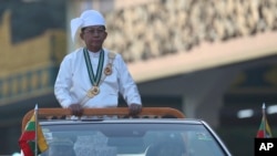 Myanmar's Senior Gen. Min Aung Hlaing, head of the military council, inspects officers during a ceremony marking the 75th anniversary of Independence Day in Naypyitaw, Myanmar, Jan. 4, 2023. 