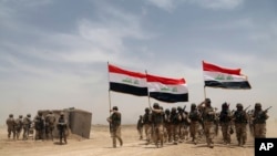 AQSh askarlari Iroq armiyasi bilan mashq o'tkazmoqda. 27-may 2015-yil