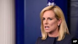 FILE - Department of Homeland Security Secretary Kirstjen Nielsen speaks at the White House in Washington, June 18, 2018. 