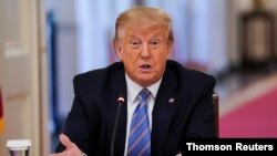 FILE PHOTO: U.S. President Trump hosts coronavirus response event on reopening schools at the White House in Washington