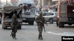 د سوریې د نوي حکومت وسله وال د حمص په ښار کې ګزمه کوي. 