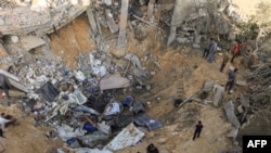 კრატერი, რომელიც ღაზის სექტორის ქალაქ რაფაში ისრაელის დაბომბვის შედეგად წარმოიშვა. 10 ნოემბერი, 2023 წ.